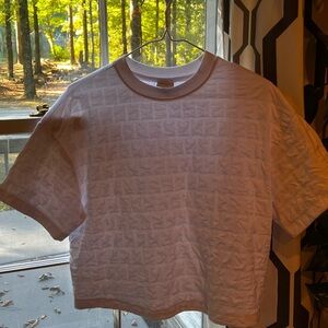 Super cute white short shirt. Excellent condition.